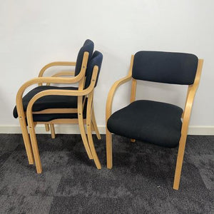 3 black fabric meeting chairs