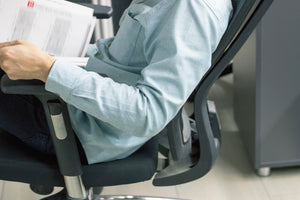 Man in a used office chair