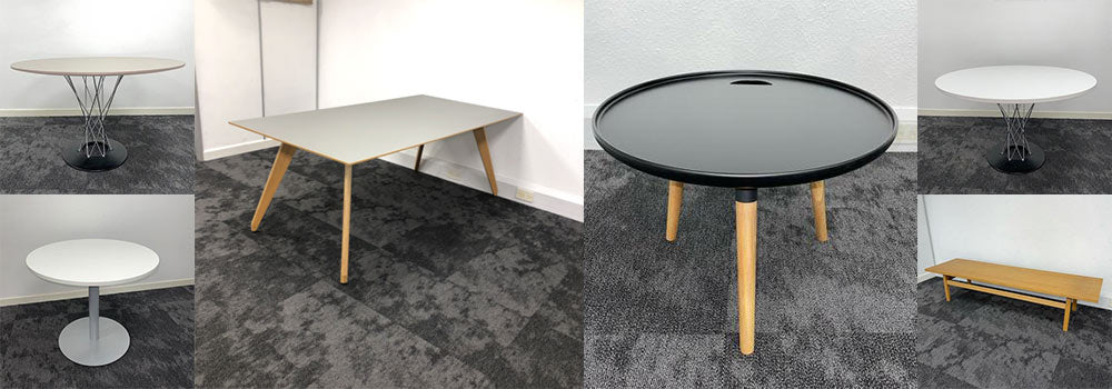 collection of used metting tables in an office setting
