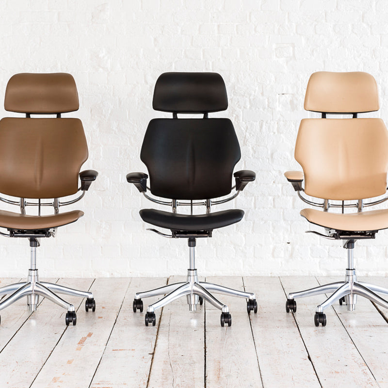 three humanscale freedom office chairs in a row