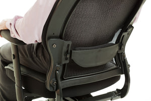 Back of a second-hand office chair, showing lumbar support