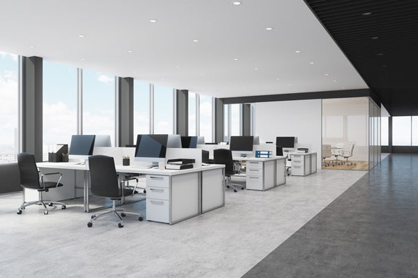 Go to article: office furnished in white with used office desks chairs and storage