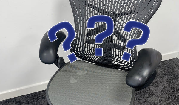 Go to article: three question marks on the background of a second hand office chair