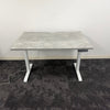Used Single Motor Electric Desk with White Frame and Concrete Top