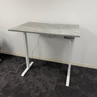 Used Single Motor Electric Desk with White Frame and Concrete Top