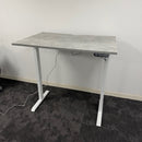 Used Single Motor Electric Desk with White Frame and Concrete Top