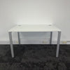 Used White Single Bench Desk with Portholes and Modesty Panel