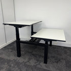Used Fumac Double Electric Back to Back Height Adjustable Bench Desk