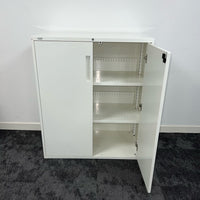 office storage - white used office cupboard with two adjustable shleves