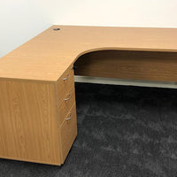 A used curved office desk in Mitcham.